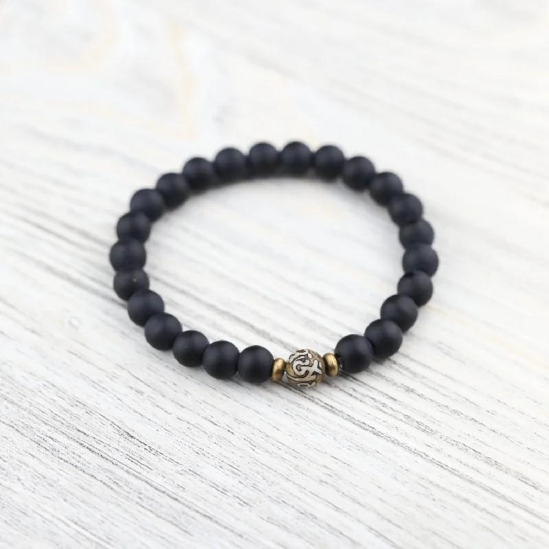 Onyx and Om Mani Naga Shell Wrist Mala