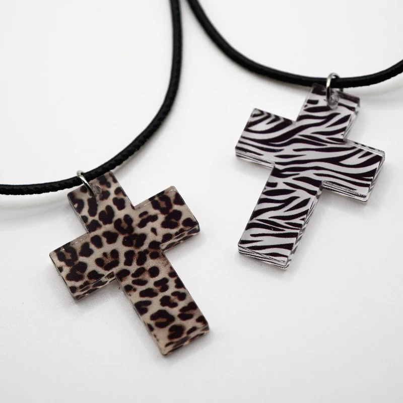 Maneater Cross Necklace