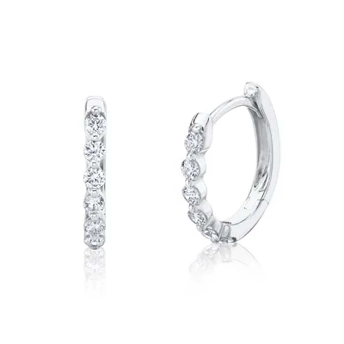 Shy Creation .26CTW Diamond Oval Huggie Earrings in 14K White Gold